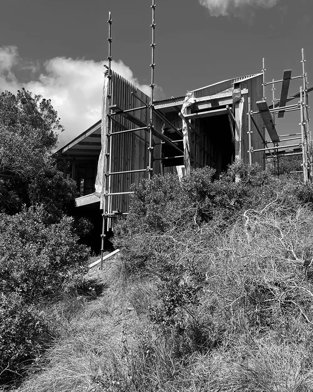 Cabin in scaffolding during construction