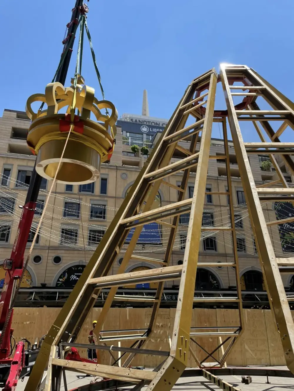 Crown lifted onto the top of the cone frame
